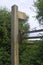 British footpath sign, stile and waymarker.