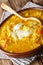 British-Indian Mulligatawny soup closeup in the bowl. Vertical