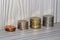 British Pounds Sterling Coins Up Close On A Wooden Background