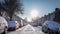 British Residential Street With Cars And Road Covered In Snow