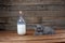 British Shorthair new born kitten near a bottle of milk