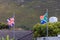 British and South African flags waving near the building in Hermanus