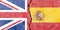 British and Spanish flag on a cracked wall-politics, war, conflict concept