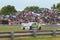 British Touring Car on the track at Thruxton with blurred background, panning effect