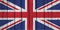 British, United Kingdom Flag Over Wood Planks