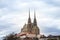 Brno Cathedral of saints peter and paul, seen from the bottom of Petrov Hill, during a cloudy afternoon.