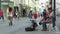 BRNO, CZECH REPUBLIC, AUGUST 11, 2017: Street musician plays on a double bass string instrument on the street of the