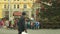 BRNO, CZECH REPUBLIC, DECEMBER 21, 2018: Christmas tree luminous and shines beautiful decorated with flasks, children at