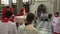 Brno, Czech Republic, September 24 , 2019: Catholic christian priest hands out sacramental bread altar communion wafers