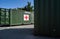 Brno, Czechia - October 08, 2021: Green metal army container box - Surgical module - with red cross, setup as field ambulance