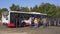 Brno, Czechia - October 08, 2021: Group of police commando with dog supervising football hooligans getting out from bus.