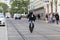 Brno_ÄŒeskÃ¡ Republika_09_28_2019 - A man riding an electric unicycle on a road in the city. Dressed in protective equipment for
