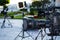 Broadcast tv; movie shooting camera or video production and film, tv crew team with camera