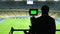 Broadcasting football match TV camera, green screen, coverage