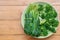 Broccoli and Bok choy on wood table