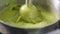 Broccoli cooking close-up blender. Cook green cream soup with vegetables.