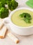 Broccoli soup dieting food with croutons on