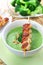 Broccoli soup with skewered chicken