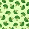 Broccoli vegetables seamless pattern on green background, green broccoli ingredients food