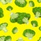 Broccoli vegetables seamless pattern on yellow background. Eco vegetables background. Best for menu vegan designs.