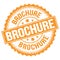 BROCHURE text on orange round stamp sign