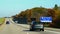 Brockville, Canada - October 28, 2019 - The view of the traffic on Route 401 highway overlooking the sunning colors of fall