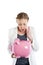 Broke woman holding a piggy bank against a white background