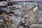 Broken asbestos floor tile in abandoned building