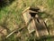 Broken bird house on forest ground