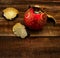 Broken Christmas ball with glass shards on wooden table