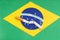 A broken cigarette is on the Brazilian flag as a symbol of the harm of smoking.