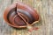 Broken dishes on a wooden background