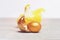 Broken easter golden egg shell, yellow hen, chicken bird