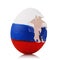 Broken egg painted in the color of Russian flag on white background. Concept on the subject of blow to Orthodoxy