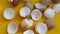 Broken egg shells on rotating yellow table