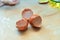 Broken eggshell of three eggs lies on the table in the kitchen at home