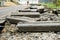 Broken freshly dug up old curbstones with pieces of an asphalt and earth lying on the road in Moscow