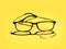 Broken glasses, eyeglasses, lens fallen out on yellow background for copyspace. Optical health or eyewear.