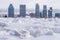 Broken ice after freezing rain and Montreal skyline