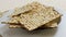 Broken matzah on a plate on the table rotates in a circle.