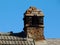 broken old brick chimney of meat smoker building