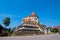 The broken old pagoda with blue sky in Chiang Mai