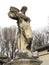 Broken old sculpture of an angel above a tomb in the Pere Lachaise cemetery. All Saints Day, November 1, Day of the Dead, Dia de