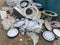 Broken pieces of wall ceiling clock at the dumpster.