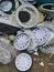 Broken pieces of wall ceiling clock at the dumpster.