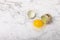 Broken quail egg on the surface.