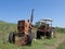 Broken rusty tractor on farm