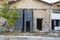 Broken sliding wooden doors on an old factory building