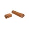 Broken stick of cinnamon. Aromatic spice used in variety of dishes, drinks and sweets. Spicy seasoning. Cuisine theme