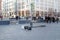 Broken street lantern surrounded by fences lies on the street in Moscow